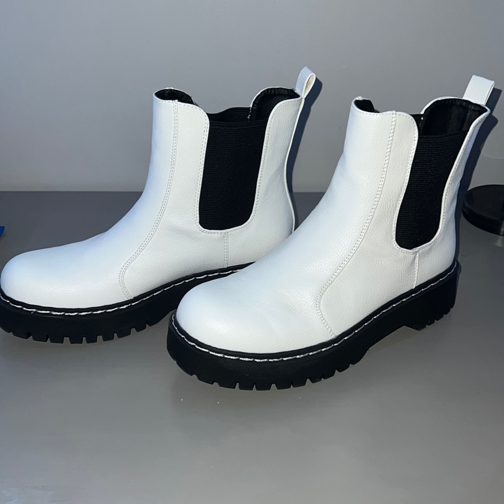white and black boots